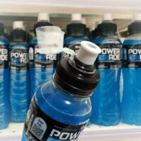 Coca Cola Sports Drink Tethered Caps Cocacola sustainable tethered caps for sports drinks by trimas packaging